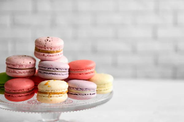 Colorful tasty macaroons in glass — Stock Photo, Image