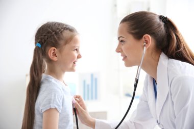 Cute girl visiting doctor clipart