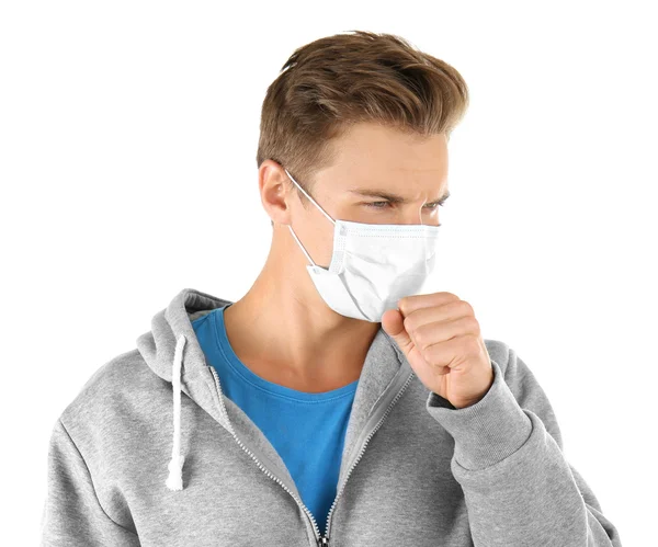 Jongeman met gezichtsmasker — Stockfoto