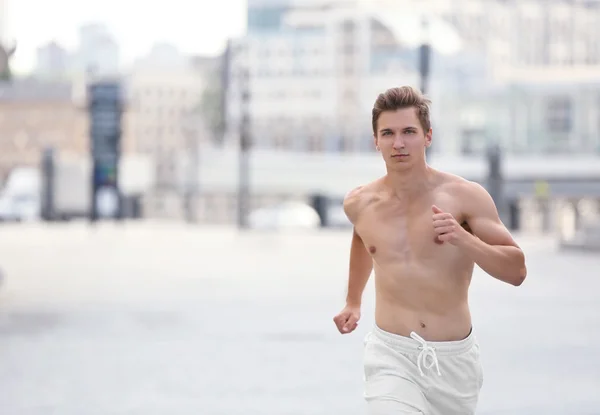 Young man running — Stock Photo, Image