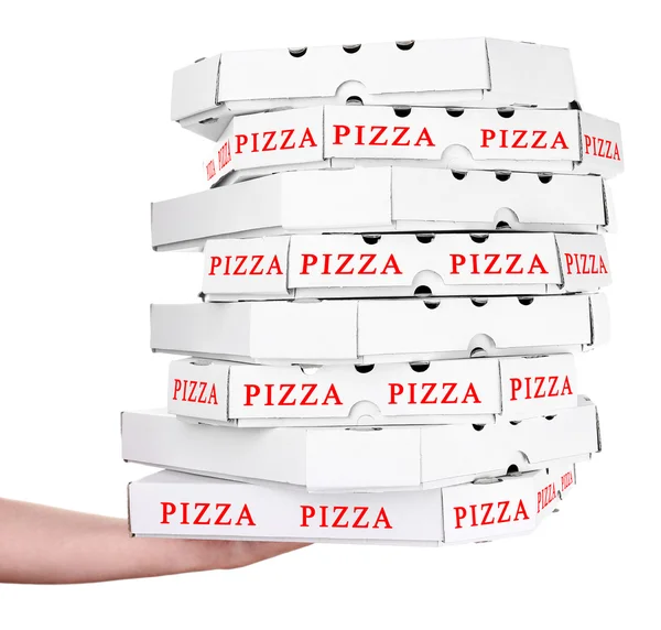 Рука держит коробки для пиццы — стоковое фото