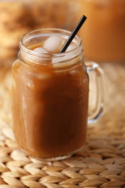 Iced coffee in glass jar — Stock Photo, Image