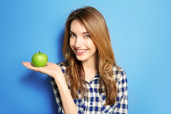 Beautiful girl with green apple — Stock Photo, Image