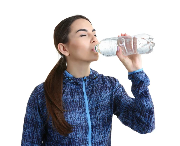 Young woman drinking water — Stock Photo, Image