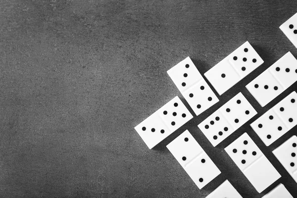 Dominoes on grey background — Stock Photo, Image