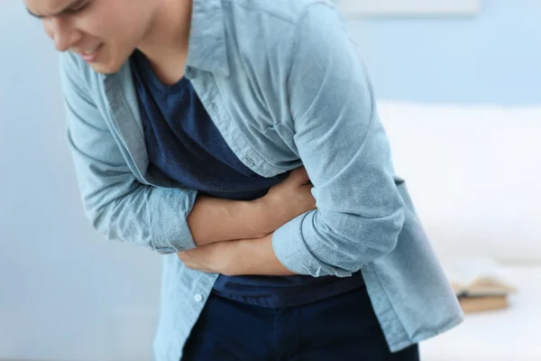 Homem Infeliz Sofrendo Dor Barriga Casa — Fotografia de Stock