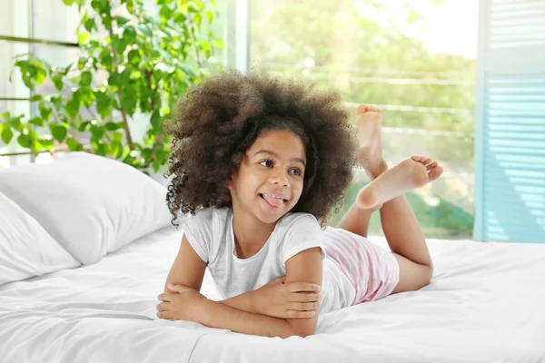 African girl in bed — Stock Photo, Image