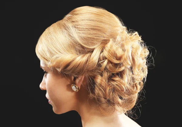 Young woman with elegant hairstyle Royalty Free Stock Images