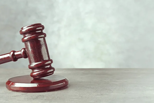 Wooden gavel on grey — Stock Photo, Image