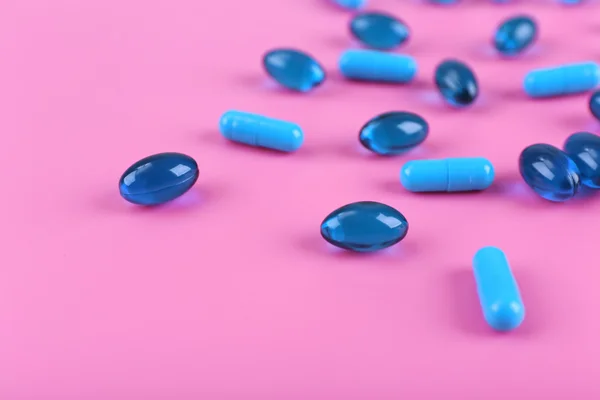 Píldoras de color en rosa — Foto de Stock