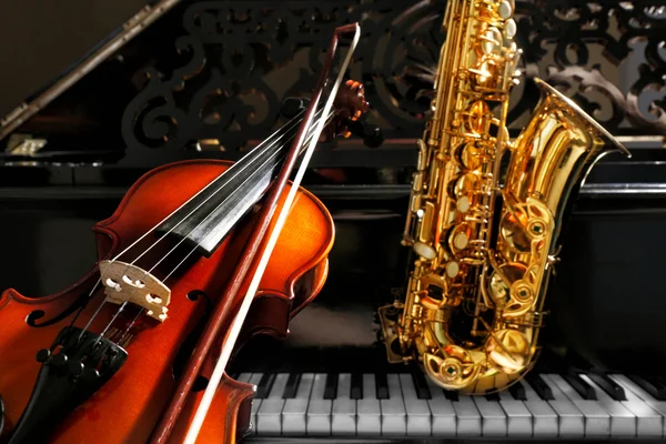 Violin with saxophone and piano — Stock Photo, Image