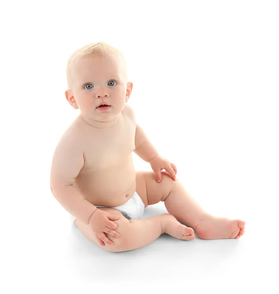 Bebê sentado no branco — Fotografia de Stock