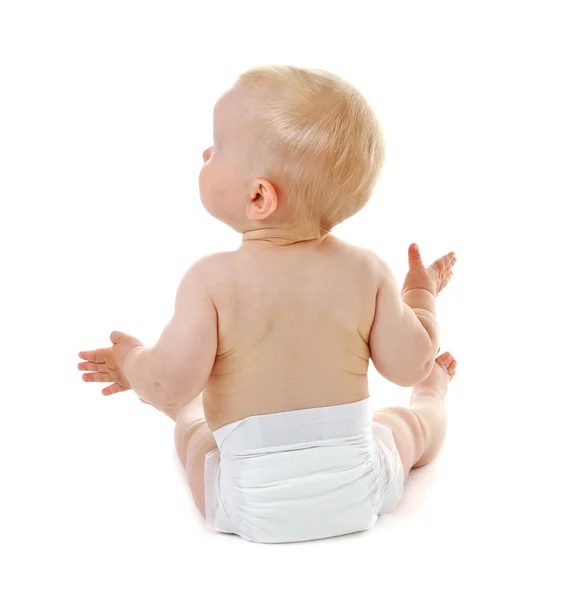 Baby sitzt auf Weiß — Stockfoto