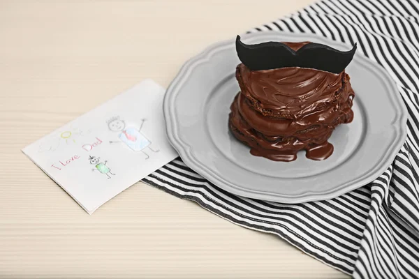 Chocolate pancakes with mustache and paint — Stock Photo, Image