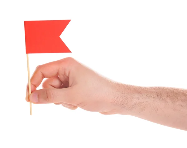 Hand mit roter Fahne — Stockfoto