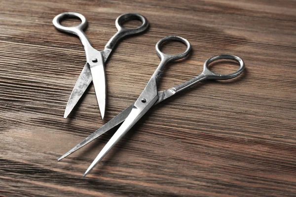 Vintage scissors on wood — Stock Photo, Image