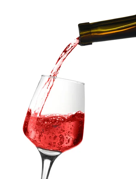 Vino rosso versando nel bicchiere di vino — Foto Stock