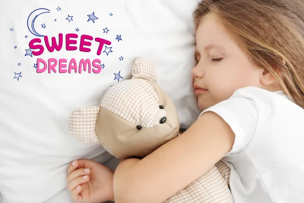 Girl sleeping with teddy bear — Stock Photo, Image