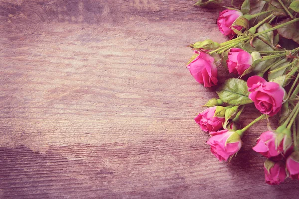 Beautiful bouquet of pink little roses — Stock Photo, Image