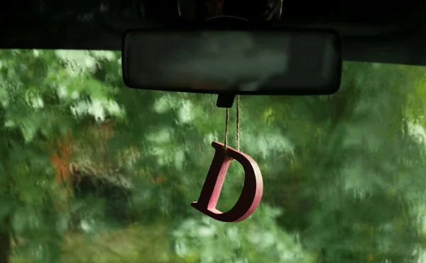 Air freshener hanging in car — Stock Photo, Image