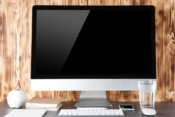 Modern workplace with computer monitor — Stock Photo, Image