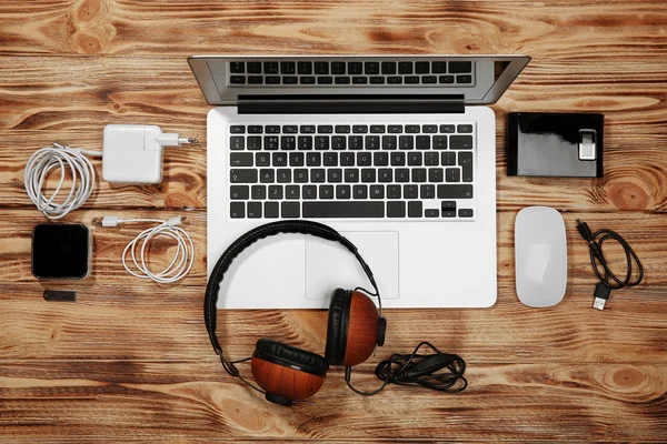 Laptop with different accessories — Stock Photo, Image