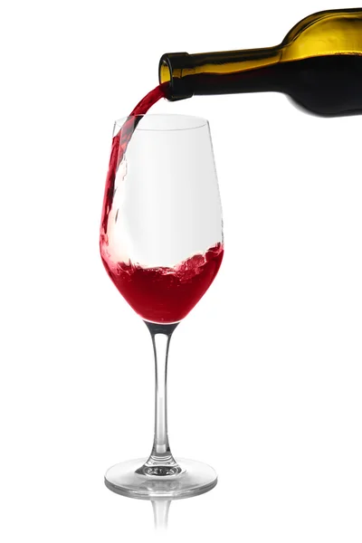 Red wine pouring into wine glass — Stock Photo, Image