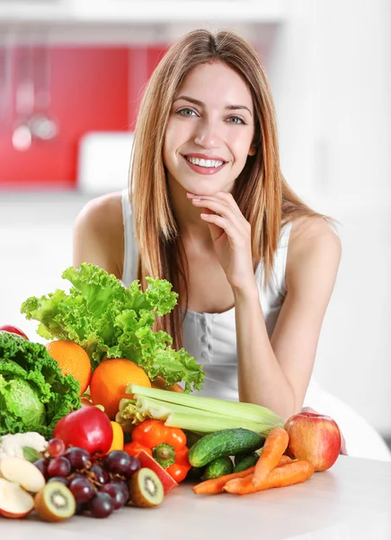 Woman with fresh vegetables and fruits Royalty Free Stock Images