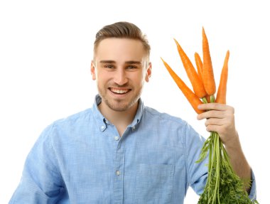 Yakışıklı adam yeme havuç 