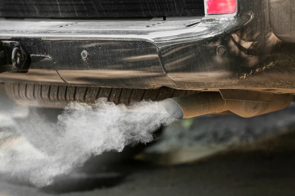 Exhaust pipe with smoke emission — Stock Photo, Image