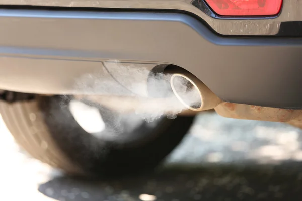 Exhaust pipe with smoke emission — Stock Photo, Image