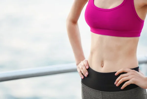 Young woman in sportswear — Stock Photo, Image