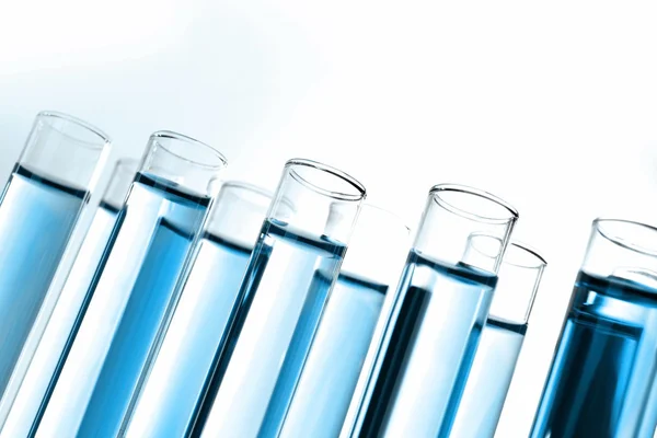 Test tubes with blue samples — Stock Photo, Image