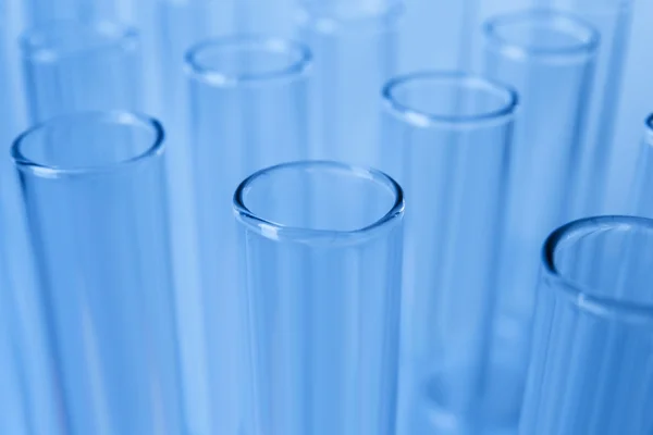 Test tubes on blue — Stock Photo, Image