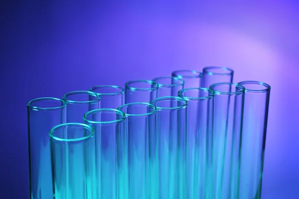 Test tubes on blue — Stock Photo, Image