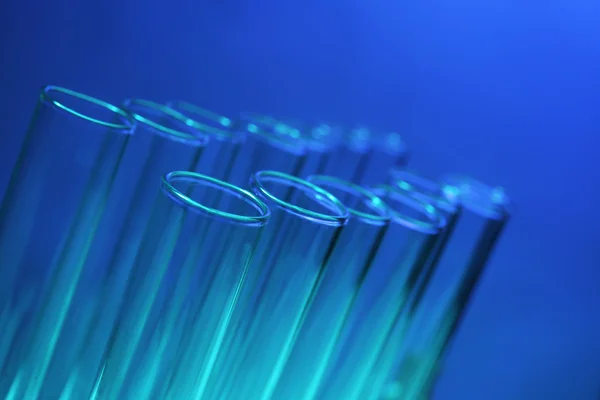 Test tubes on blue — Stock Photo, Image