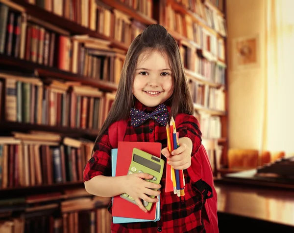 Cute little girl with backpack — Stock Photo, Image