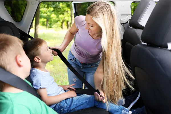 Mother fastening security belt — Stock Photo, Image