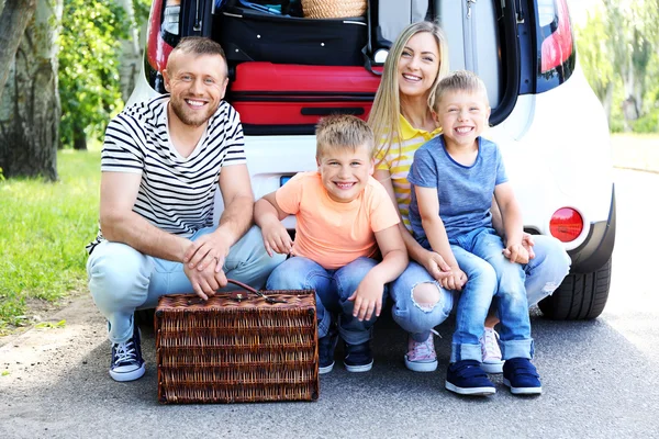 Beautiful family near car — Stock Photo, Image