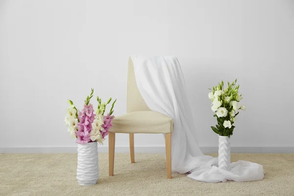 Chair  and decorative flowers — Stock Photo, Image