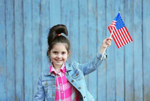 Fille avec drapeau américain Image En Vente