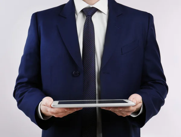 Businessman with tablet closeup — Stock Photo, Image