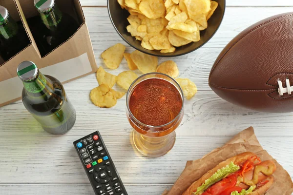 Glass of beer and snack — Stock Photo, Image