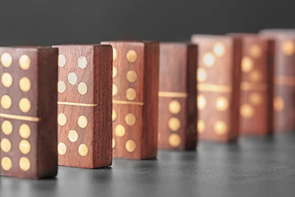 Wooden dominoes on table — Stock Photo, Image