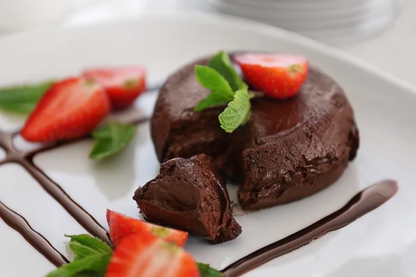 Chocolate fondant with strawberry — Stock Photo, Image