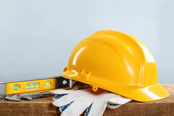 Construction tools and helmet — Stock Photo, Image