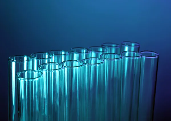 Test tubes on blue — Stock Photo, Image