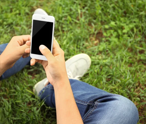 Young man with gadget Stock Picture