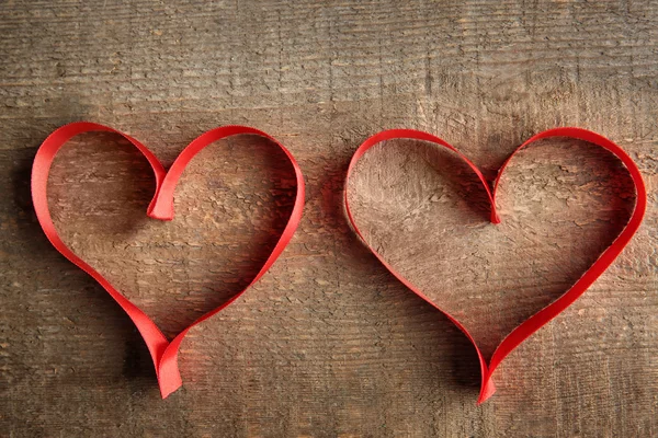 Red ribbon hearts — Stock Photo, Image