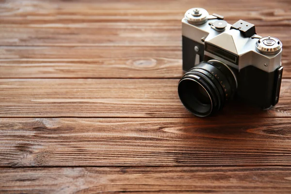 Retro kamera på bakgrund — Stockfoto